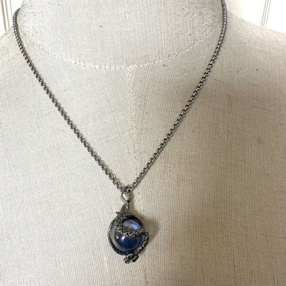 Blue glass snake wrapped pendant necklace